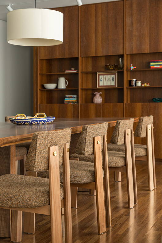 Santo Antonio Apartment / Balaio Arquitetura Santo Antonio Apartment / Balaio Arquitetura - Interior Photography, Closet, Wood, Table, Chair, Lighting