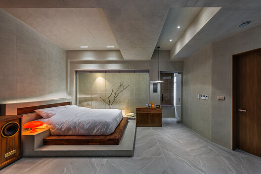Edificio de uso mixto Urban Egg / U.GA Architects Edificio de uso mixto Urban Egg / U.GA Architects - Fotografía interior, Dormitorio, Madera, Iluminación, Camas
