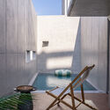 Edificio de uso mixto Urban Egg / U.GA Architects - fotografía de interiores, hormigón