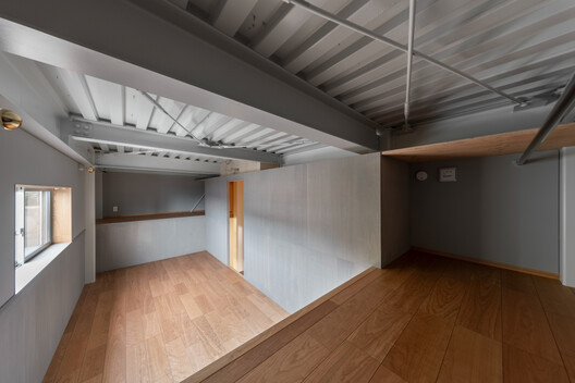 Casa elevada del suelo / nanometer architecture - Fotografía interior, Cocina, Madera