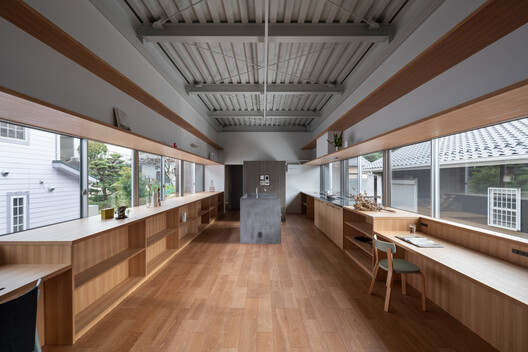 Casa elevada del suelo / nanometer architecture - Fotografía interior, Cocina, Madera