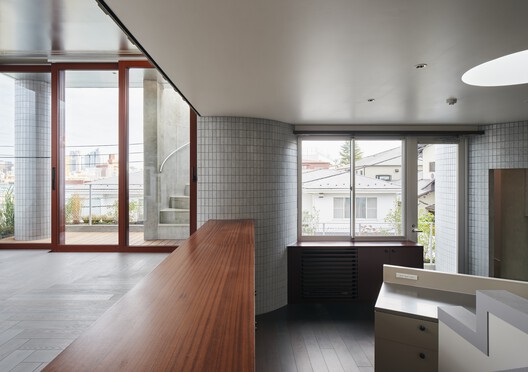 Apartment in Uehara / ULTRA STUDIO Apartment in Uehara / ULTRA STUDIO - Interior Photography, Kitchen, Wood, Stairs, Concrete, Handrail, Balcony