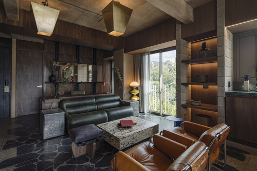 23 Living / Plan:b arquitectos 23 Living / Plan:b arquitectos - Interior Photography, Living Room, Wood, Chair