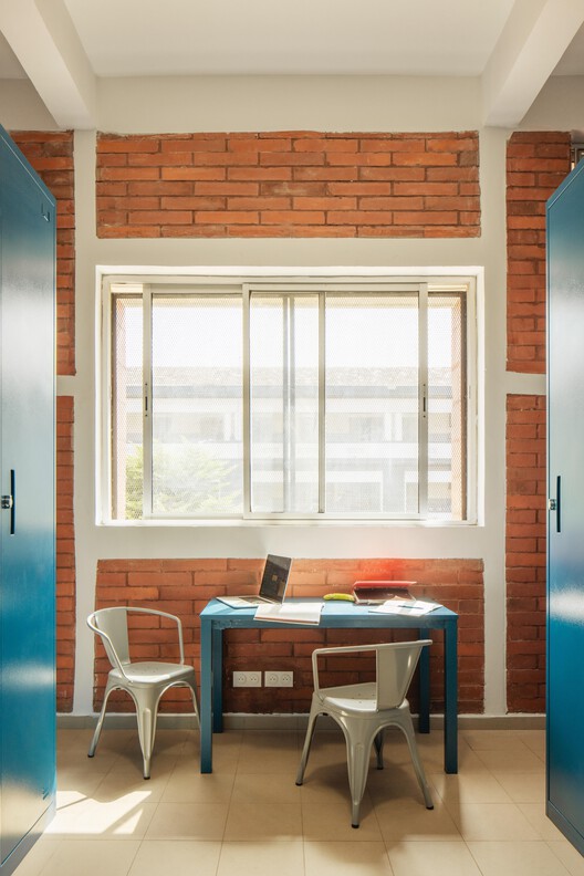 UCAD Dakar Student Housing / Hardel Le Bihan Architectes UCAD Dakar Student Housing / Hardel Le Bihan Architectes - Interior Photography, Wood, Chair, Brick, Glass