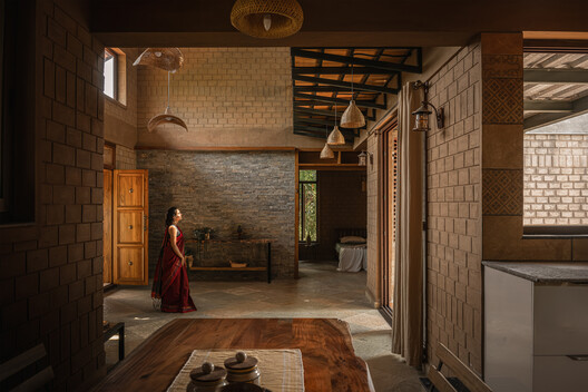 The Saffron Verandah House / HabitArt Architecture Studio The Saffron Verandah House / HabitArt Architecture Studio - Interior Photography, Wood, Lighting, Brick, Beam, Chair