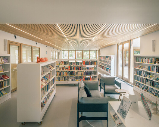 Val d'Oust Cultural Center / Atelier 56S - Interior Photography, Living Room, Shelving, Wood