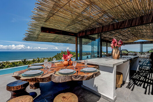 Txai Bungalow / TETRO Arquitetura Txai Bungalow / TETRO Arquitetura - Exterior Photography, Wood, Chair, Coast