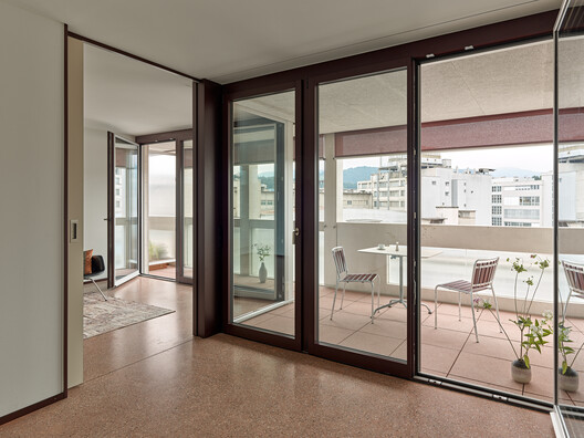 Housing on top of the petrol station / Gut Deubelbeiss Nill Architekten Housing on top of the petrol station / Gut Deubelbeiss Nill Architekten - Interior Photography, Wood, Door, Glass