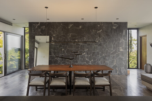 Shadows House / Seiro Arquitectos Shadows House / Seiro Arquitectos - Interior Photography, Dining room, Wood, Table, Lighting, Chair, Glass