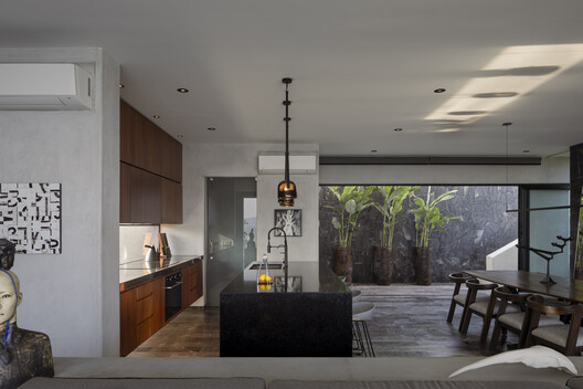 Shadows House / Seiro Arquitectos Shadows House / Seiro Arquitectos - Interior Photography, Kitchen, Wood, Countertop, Lighting, Glass, Chair