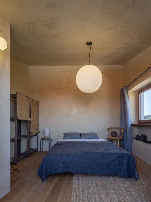 Castelo House / Gonçalo Grácio Castelo House / Gonçalo Grácio - Interior Photography, Bedroom, Wood, Bed, Lighting