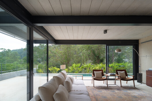 House in Santana do Parnaíba / GRUPOSP House in Santana do Parnaíba / GRUPOSP - Interior Photography, Living Room, Wood, Chair, Table, Glass, Beam