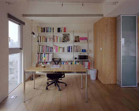 Raw & Warm Residence / Habitat Architects Raw & Warm Residence / Habitat Architects - Interior Photography, Closet, Wood, Shelving, Table, Chair, Lighting