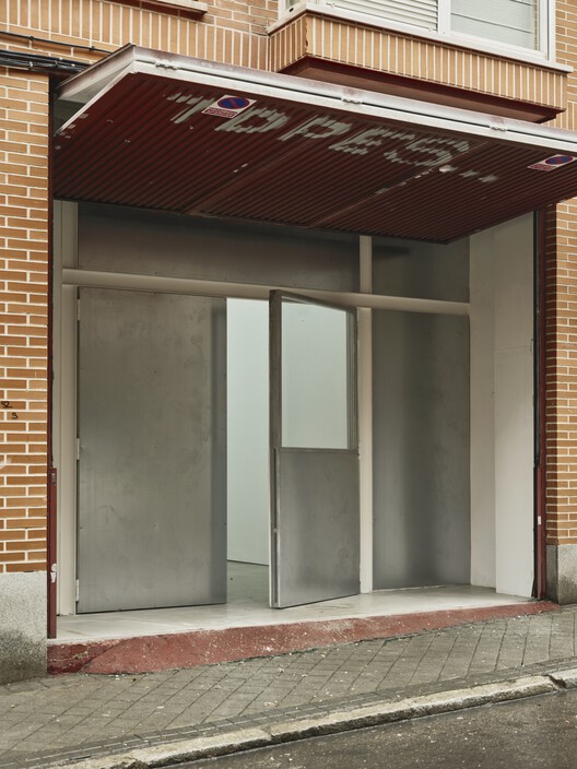 Hybrid Infrastructure Doble Erre / Morphism Hybrid Infrastructure Doble Erre / Morphism - Interior Photography, Door, Glass, Brick, Concrete