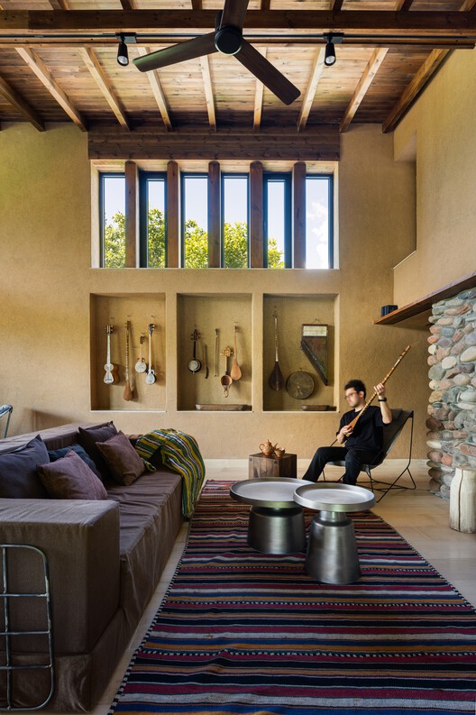 Country House in Boladala Village / ARC Architects Country House in Boladala Village / ARC Architects - Interior Photography, Living Room, Sofa, Wood, Lighting, Table, Chair