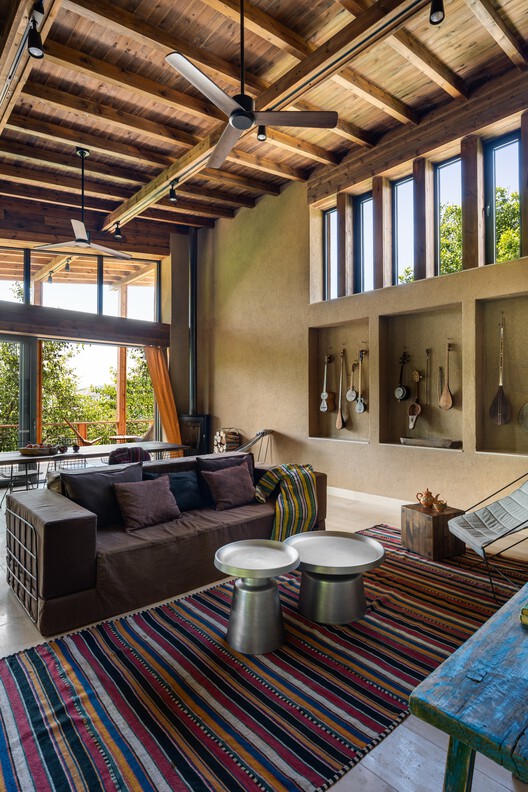 Country House in Boladala Village / ARC Architects Country House in Boladala Village / ARC Architects - Interior Photography, Living Room, Wood, Table, Lighting, Sofa, Chair
