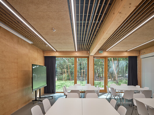 Public Library in Choszczówka / Ambient - Interior Photography, Dining room, Wood, Chair