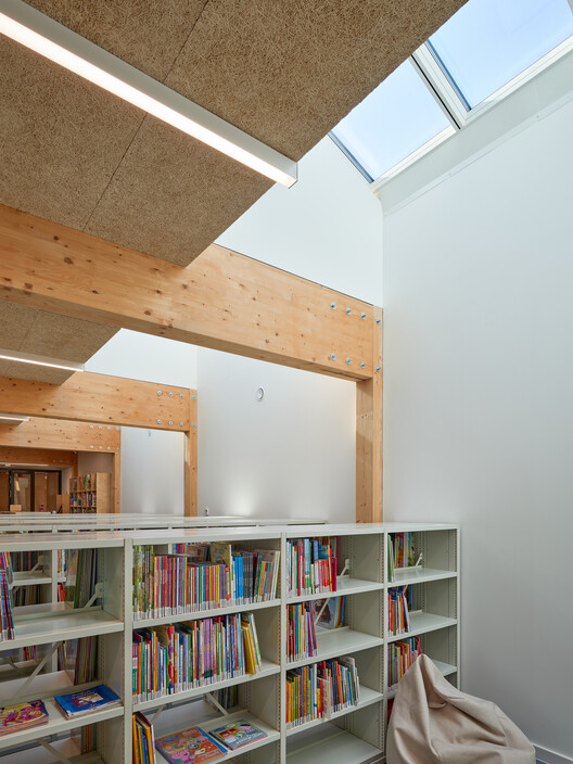 Public Library in Choszczówka / Ambient - Interior Photography, Closet, Wood, Shelving, Beam