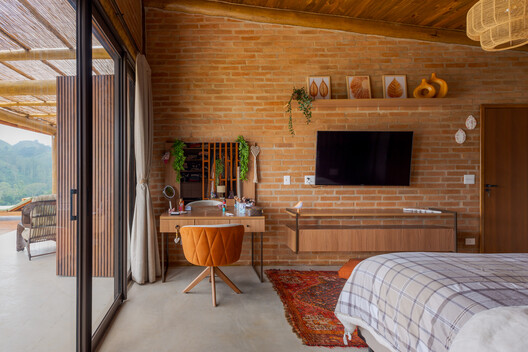 C.E. House / Dall'Ovo Magalhães Arquitetura C.E. House / Dall'Ovo Magalhães Arquitetura - Interior Photography, Bedroom, Wood, Lighting, Chair, Table, Sofa