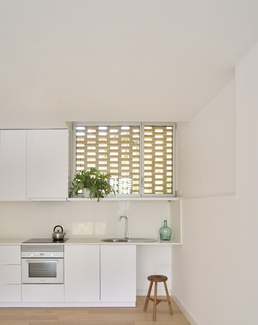 Social Atrium — 54 Social Housing Units in Besòs / Peris+Toral.arquitectes Social Atrium — 54 Social Housing Units in Besòs / Peris+Toral.arquitectes - Interior Photography, Kitchen, Countertop, Sink