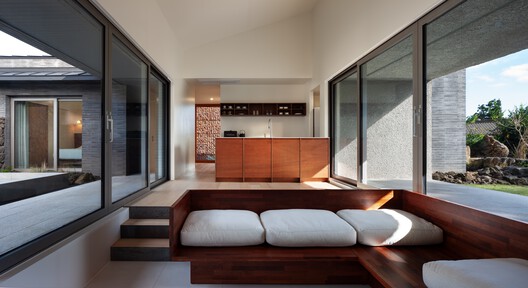Beneath Jeoji Oreum House / a root architecture Beneath Jeoji Oreum House / a root architecture - Interior Photography, Living Room, Wood, Sofa