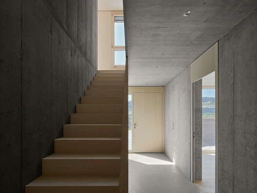House on Concrete Walls / dolmus Architekten House on Concrete Walls / dolmus Architekten - Interior Photography, Stairs, Concrete
