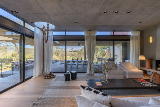 House in Estancia El Terrón / Santiago Bertotti House in Estancia El Terrón / Santiago Bertotti - Interior Photography, Living Room, Chair, Beam