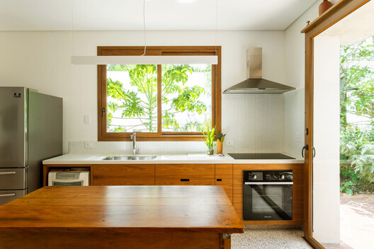 Lapa Townhouse Renovation / Estudio Piloti Arquitetura - Interior Photography, Kitchen, Countertop, Wood, Sink, Lighting
