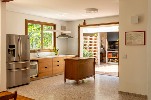 Lapa Townhouse Renovation / Estudio Piloti Arquitetura - Interior Photography, Kitchen, Countertop, Wood, Lighting