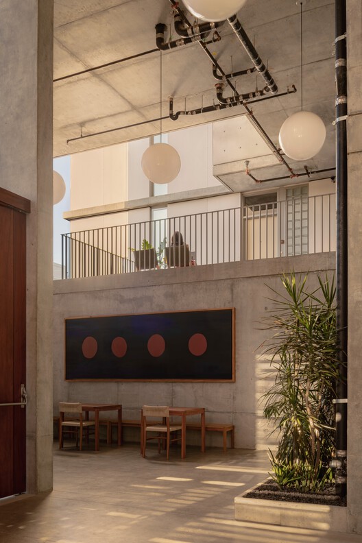 KAYA Building / Jeff Svitak KAYA Building / Jeff Svitak - Interior Photography, Wood, Lighting, Glass, Chair