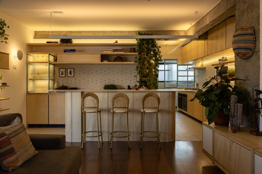 João Moura Apartment / Margem Arquitetos João Moura Apartment / Margem Arquitetos - Interior Photography, Kitchen, Wood, Lighting, Chair, Table, Countertop