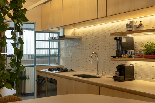 João Moura Apartment / Margem Arquitetos João Moura Apartment / Margem Arquitetos - Interior Photography, Kitchen, Countertop, Wood, Lighting, Sink