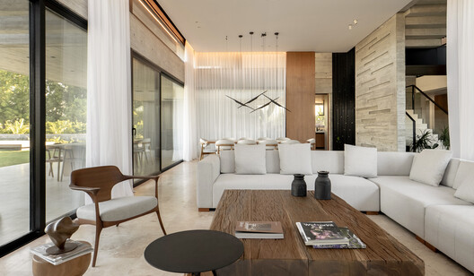 Grava House / remyarchitects Grava House / remyarchitects - Interior Photography, Living Room, Wood, Sofa, Table, Chair, Door