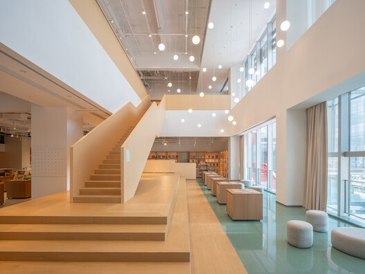 PAGEONE Bookstore at Wuxi Park Station / llLab. - Image 2 of 26
