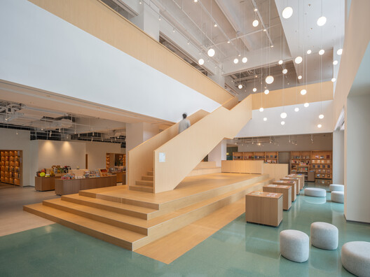 PAGEONE Bookstore at Wuxi Park Station / llLab. - Image 10 of 26