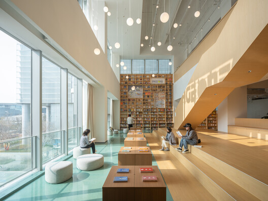 PAGEONE Bookstore at Wuxi Park Station / llLab. - Interior Photography, Wood, Shelving, Lighting, Glass, Chair