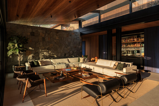 House in Los Cóndores / Malachowski Arquitectos House in Los Cóndores / Malachowski Arquitectos - Interior Photography, Living Room, Wood, Table, Sofa, Chair, Lighting