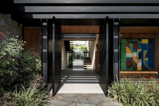 House in Los Cóndores / Malachowski Arquitectos House in Los Cóndores / Malachowski Arquitectos - Interior Photography, Wood, Door, Concrete, Courtyard