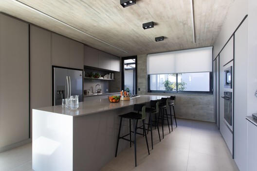 Enlevo Residence / Drucker Arquitetos Associados Enlevo Residence / Drucker Arquitetos Associados - Interior Photography, Kitchen, Countertop, Wood, Lighting, Chair