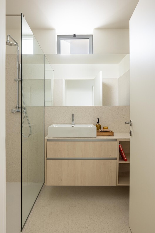 Costa Cabral Building / ATA - Atelier Tiago Antero + ENTRETEMPOS - Interior Photography, Bathroom, Sink, Door, Countertop, Toilet