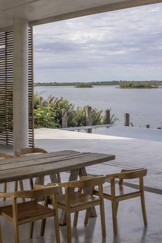 Marinas House / Pirca Arquitectura - Exterior Photography, Wood, Table, Chair, Deck