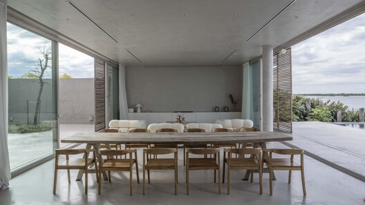 Marinas House / Pirca Arquitectura - Interior Photography, Dining room, Wood, Chair