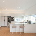 JH Gwangan Mixed-use building  / U.GA Architects - Interior Photography, Commercial Architecture, Kitchen, Countertop, Lighting, Chair