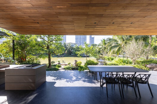 Dolphine Villa / Idee architects Dolphine Villa / Idee architects - Interior Photography, Dining room, Wood, Deck, Chair, Garden