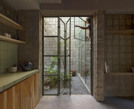 La Colmena - Multi-family Housing as Shared Neighborhood Infrastructure / Ancestra + Natura Futura La Colmena - Multi-family Housing as Shared Neighborhood Infrastructure / Ancestra + Natura Futura - Interior Photography, Glass