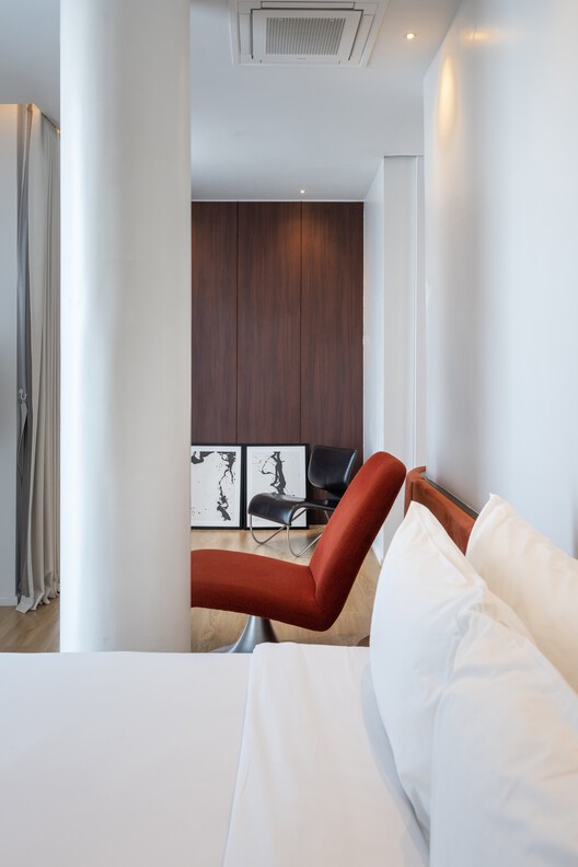 The Sayla Hotel / EKAR Architects The Sayla Hotel / EKAR Architects - Interior Photography, Bedroom, Wood, Bed