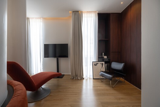 The Sayla Hotel / EKAR Architects The Sayla Hotel / EKAR Architects - Interior Photography, Living Room, Wood, Lighting, Chair