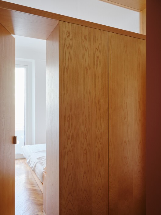 Imbriani – Renovation of Two Apartments in Milan / co.arch studio Imbriani – Renovation of Two Apartments in Milan / co.arch studio - Interior Photography, Wood, Door, Closet, Bed, Bedroom
