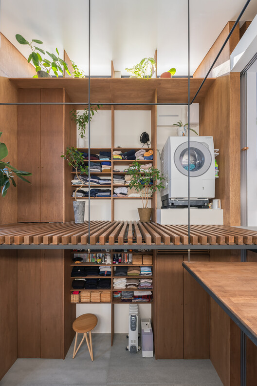 House in Kagurazaka / Takumi Wakui + Riho Wakui Architects House in Kagurazaka / Takumi Wakui + Riho Wakui Architects - Interior Photography, Kitchen, Wood, Shelving, Lighting