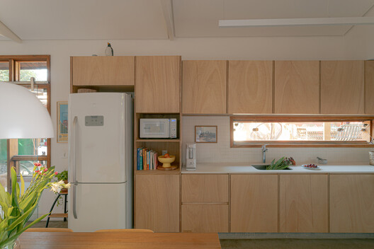 Butantã House / André Guerra Arquitetos Butantã House / André Guerra Arquitetos - Interior Photography, Kitchen, Countertop, Wood, Lighting